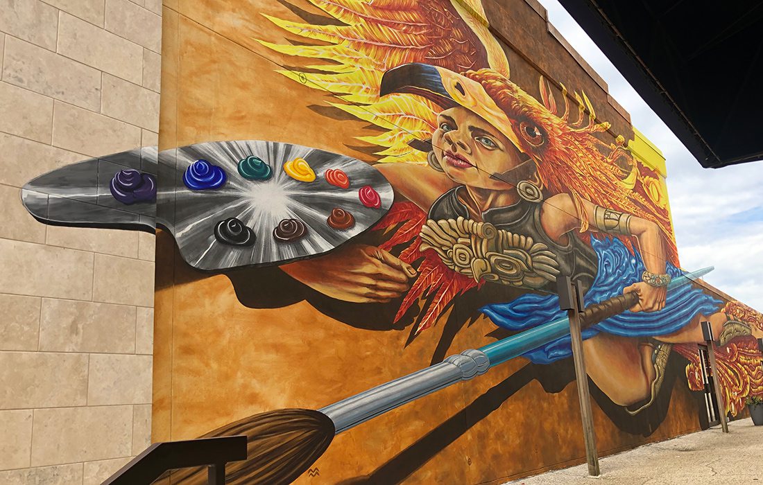 Athena mural located outside Fenix Fayetteville Art Gallery