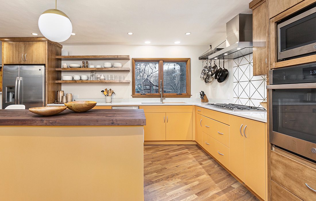 Statement orange cabinets in kitchen design