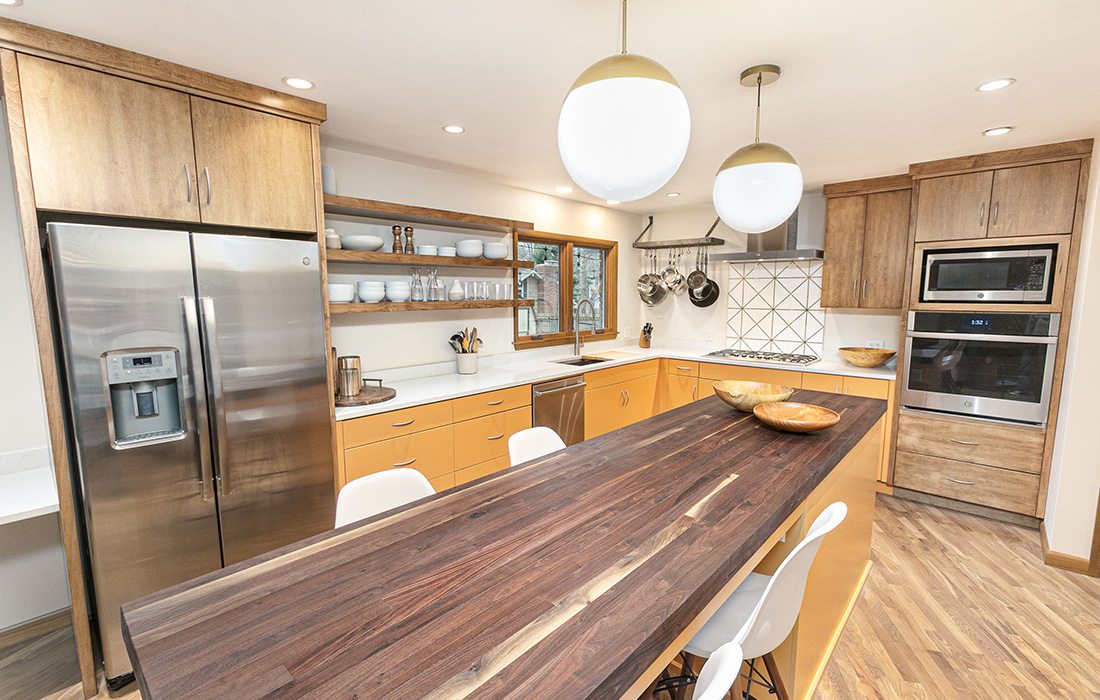 Statement orange cabinets in kitchen design