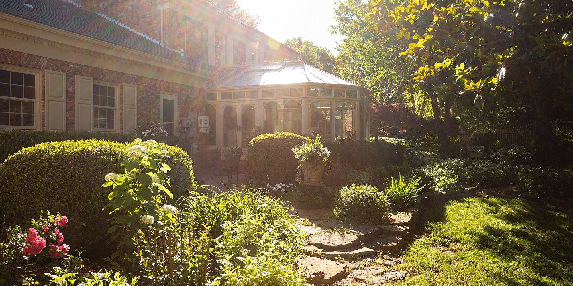 Robert and Peg Carolla’s backyard conservatory and garden