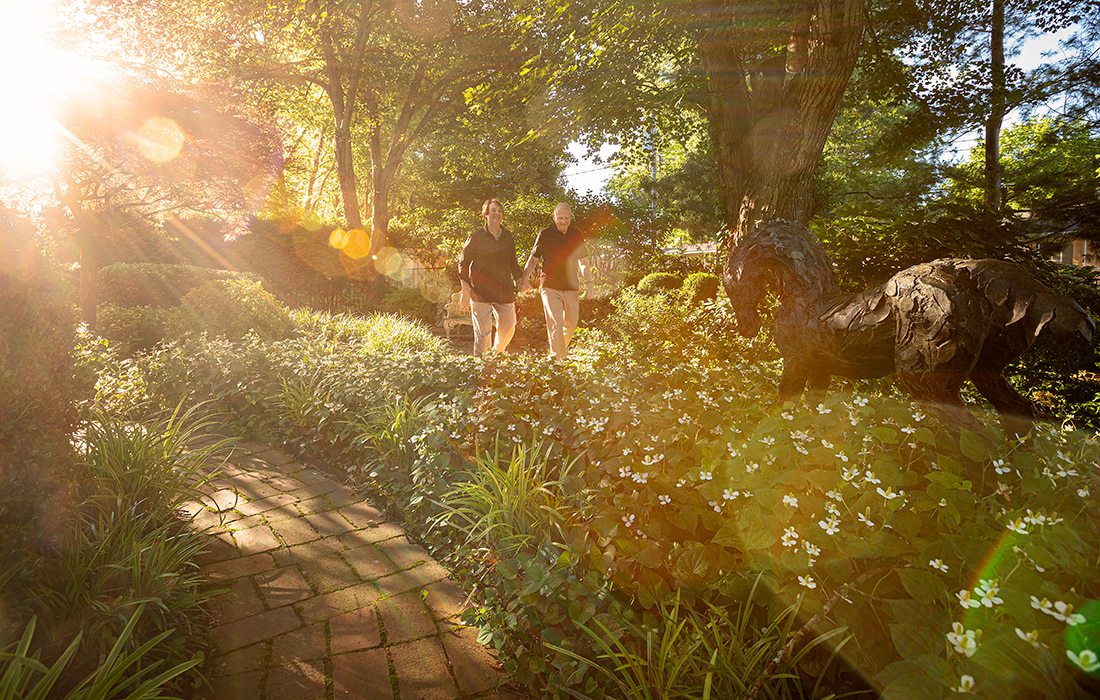 Robert and Peg Carolla in their backyard garden