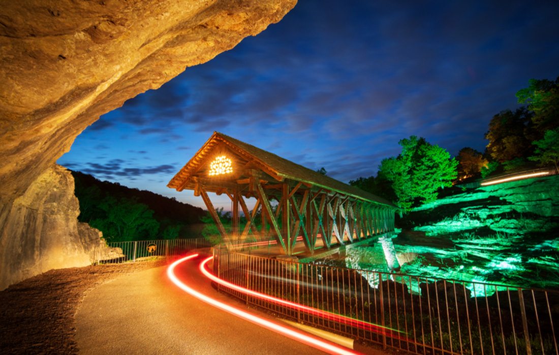 See lit up drive-thru caves.