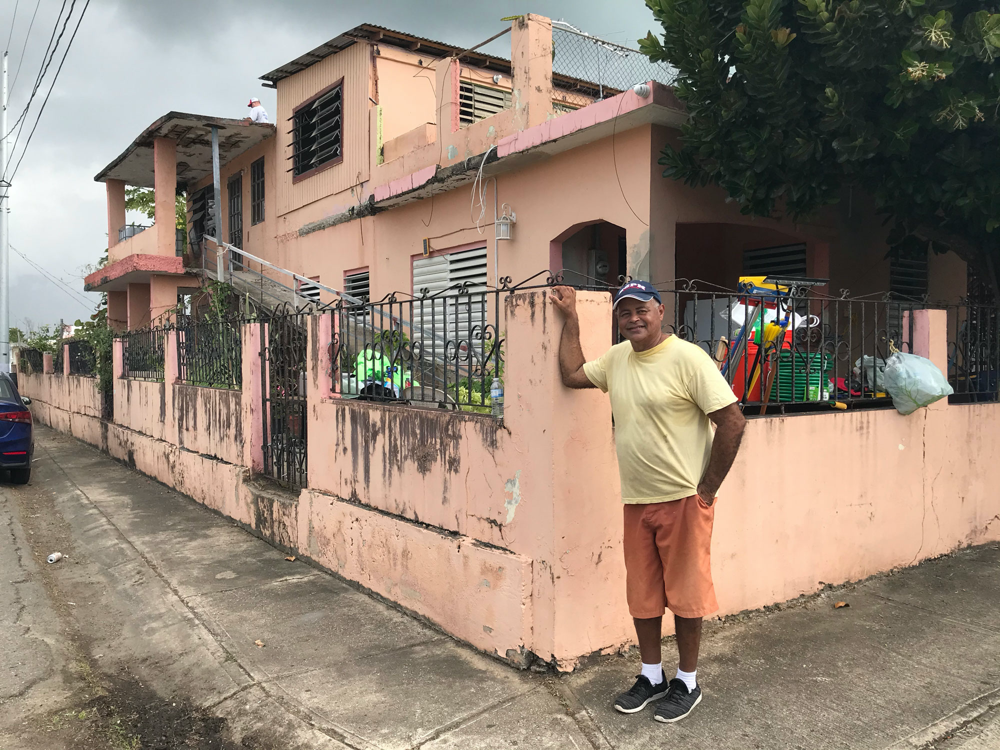 Juanito Borques outside his home.