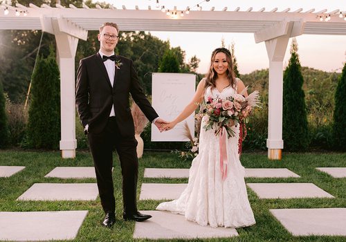 Regan King & Cindy Chao on their wedding day at Greenhouse Two Rivers in Highlandville MO