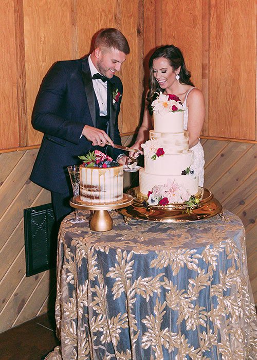 Makenzie Moore & Taylor Lambke on their wedding day at Top of the Rock in Branson, MO