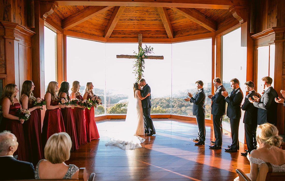 Makenzie Moore & Taylor Lambke on their wedding day at Top of the Rock in Branson, MO