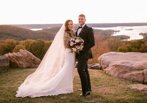 Makenzie Moore & Taylor Lambke on their wedding day at Top of the Rock in Branson, MO
