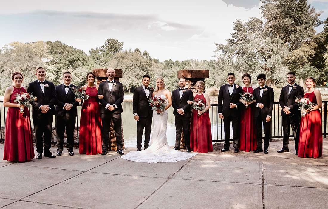 Shayan Cannefax & Jordan Duncan with their wedding party at the DoubleTree by Hilton in Springfield, MO