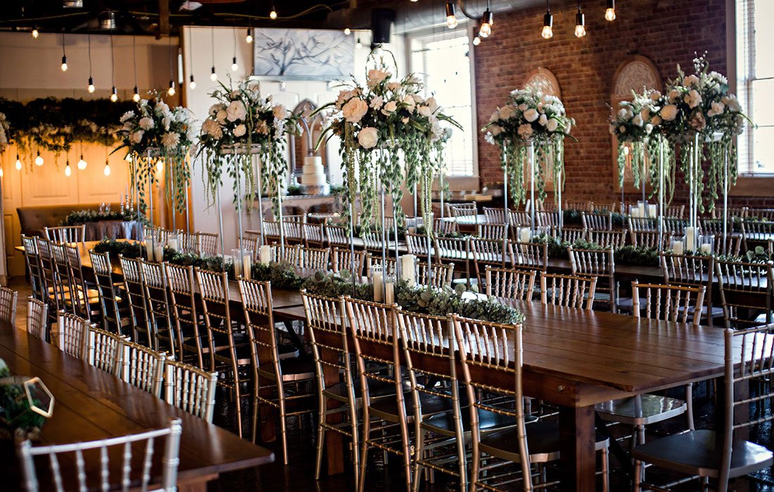 Ali Suman & Rick Peery's wedding table settings at Venue on Brick in Ozark MO