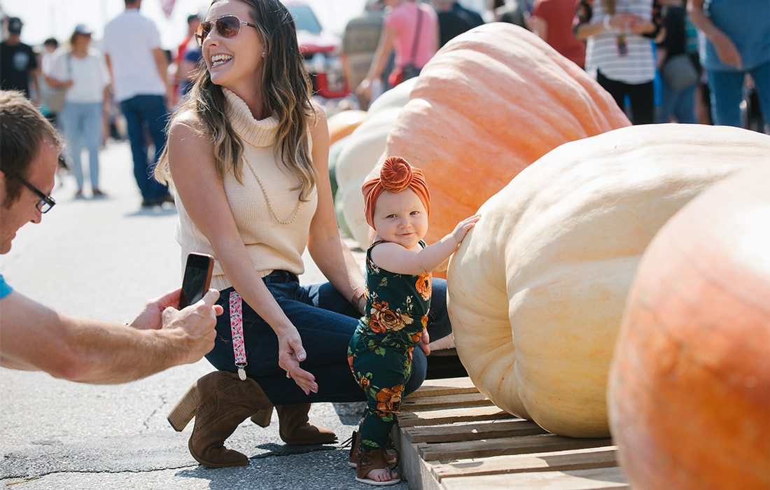Mother and baby at pumpkin festival in Republic, MO