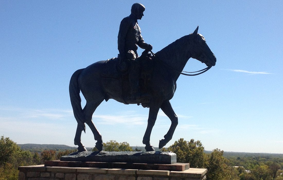 Statue of Will Rogers on horseback