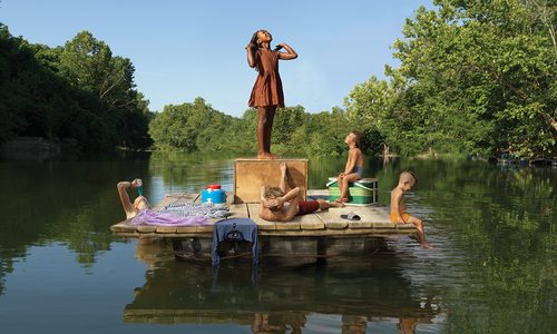 Kids on a lake photographed by Julie Blackmon
