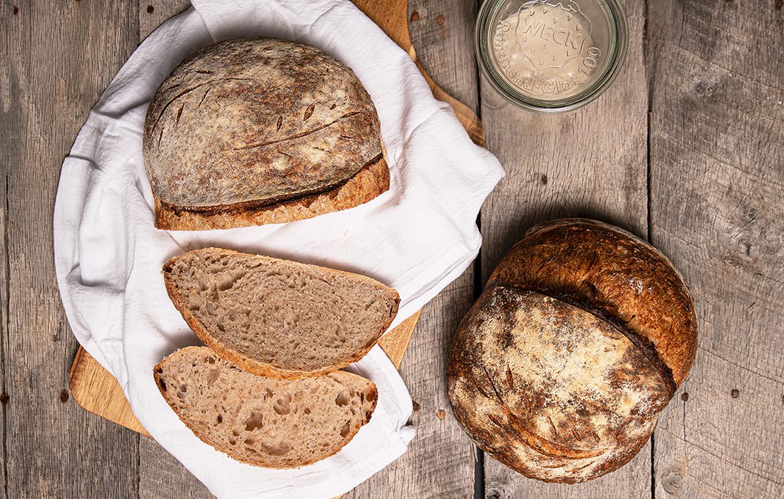 Loaves of sourdough bread by Krysten Muench