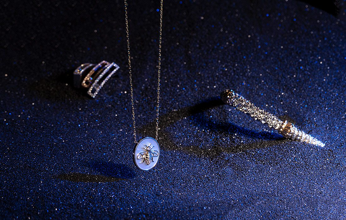 Bracelets and pendant in black sand
