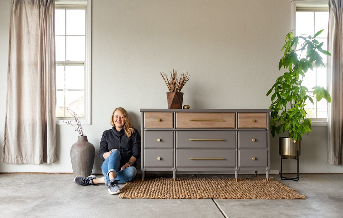 Woman next to dresser