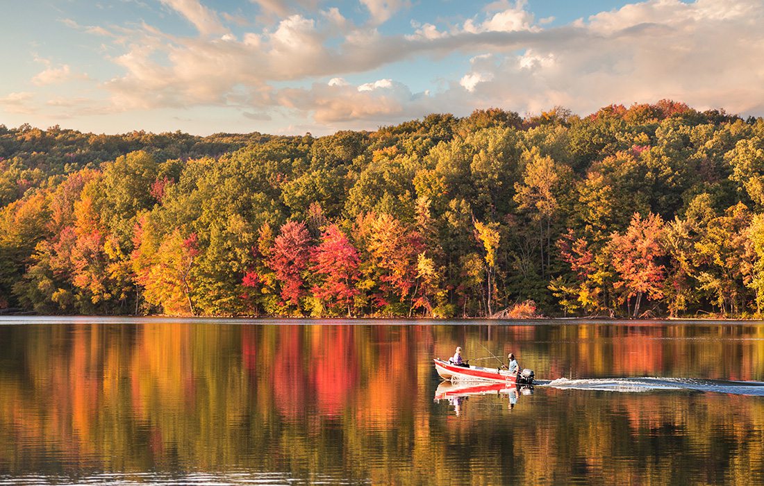 Speed boat on a lake in fall