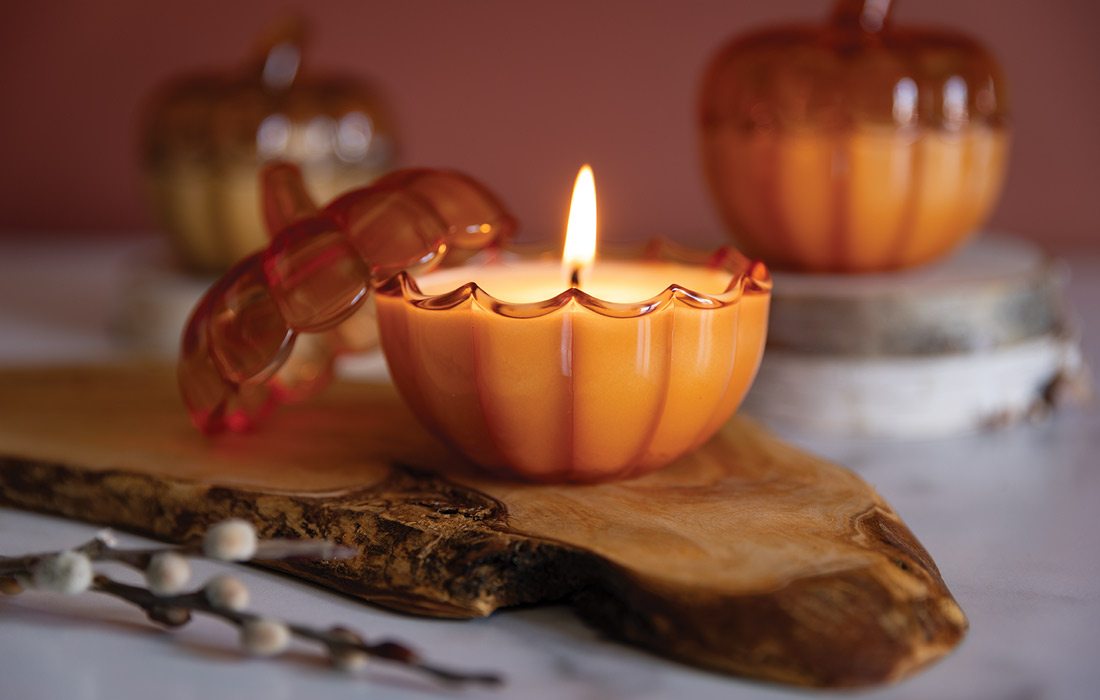 Glass pumpkin candle