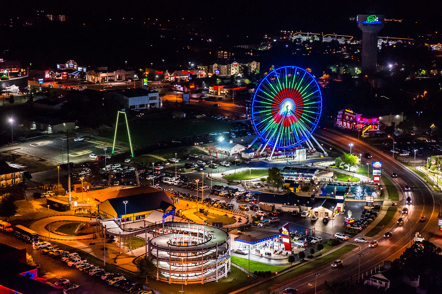 The Track and the Branson Ferris Wheel at night in Branson MO