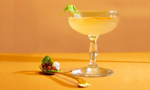Caprese Martini on orange background