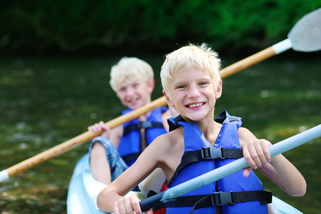 Two kids in a canoe