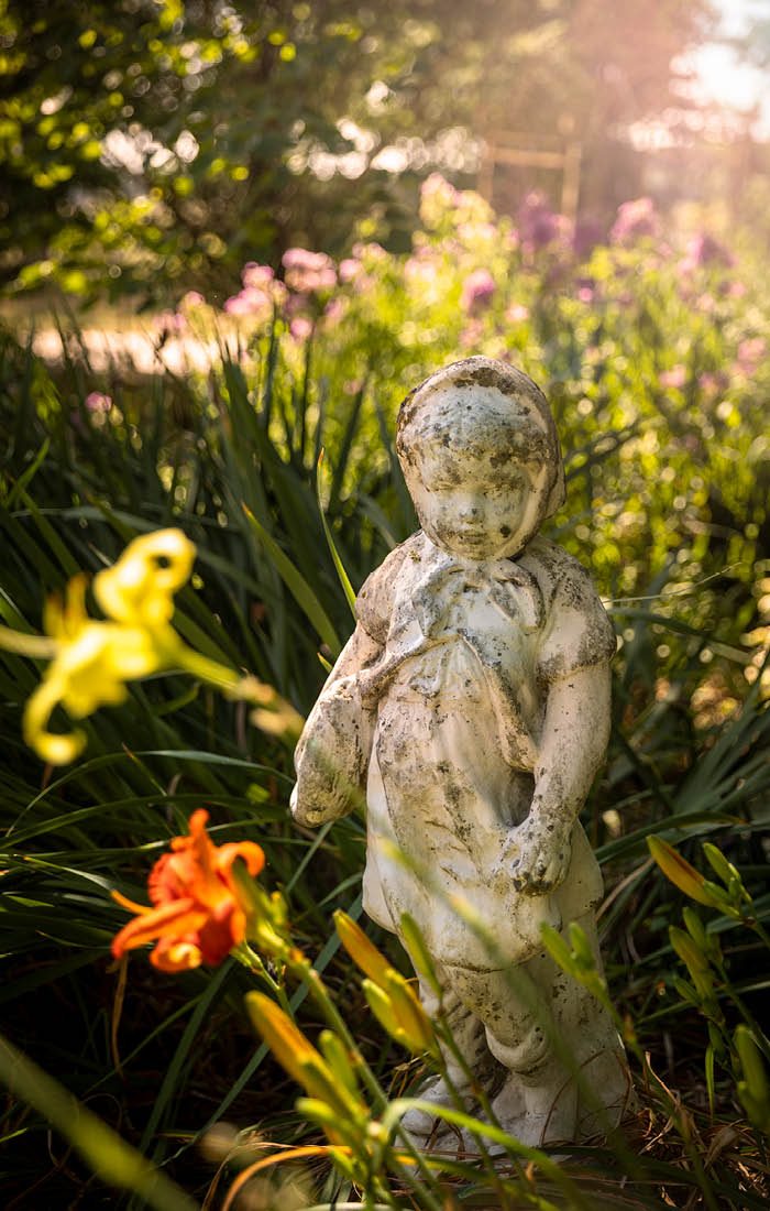 Sculpture on display in Victorian-themed southwest Missouri garden