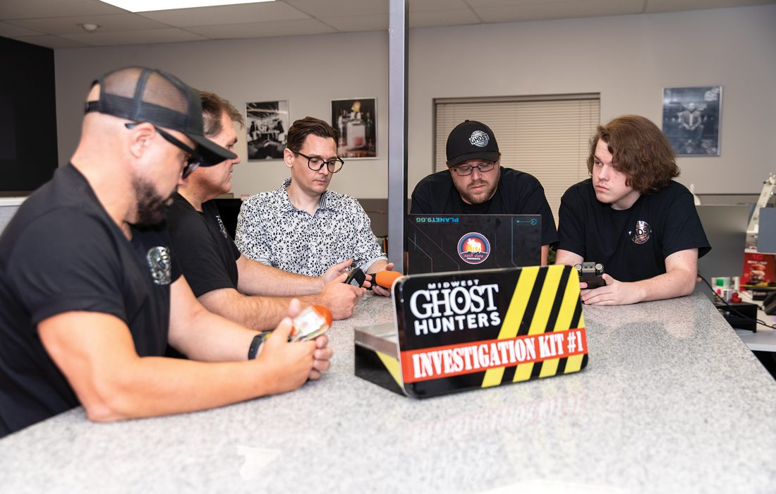 Midwest Ghost Hunters team with equipment.