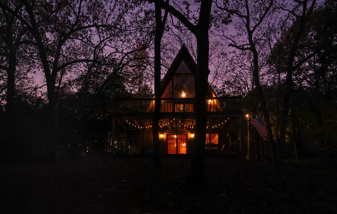 Night time exterior photo of Wildwood Cabin on Table Rock Lake