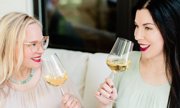 Women Sipping Wine Together
