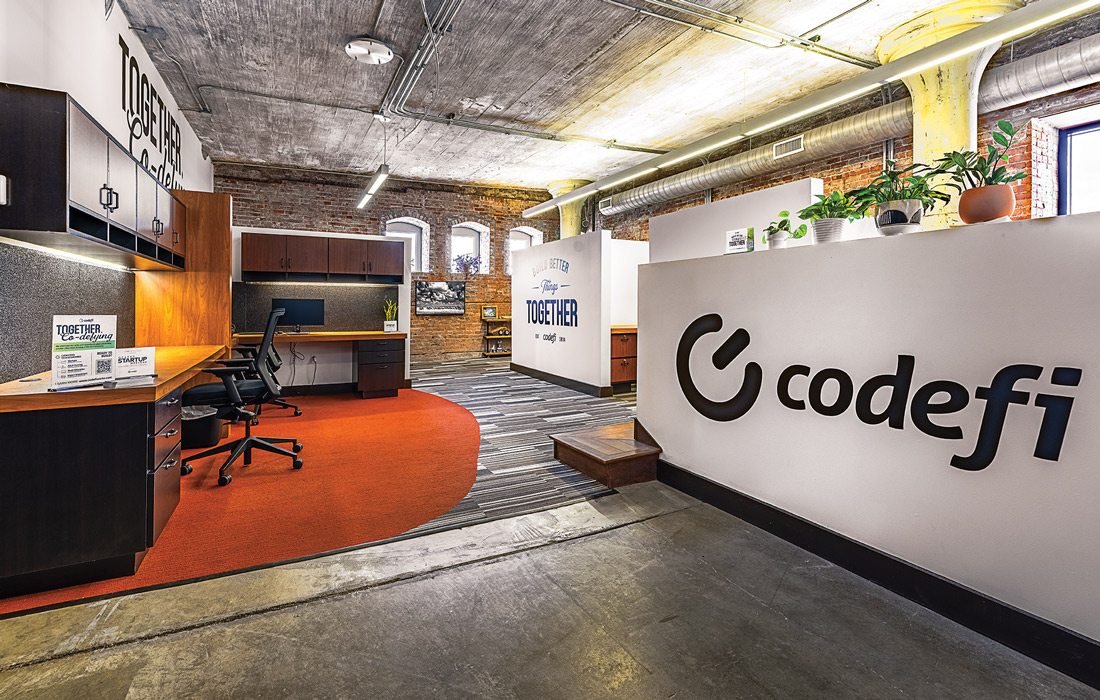 Interior photo of efactory second location with Codefi logo.