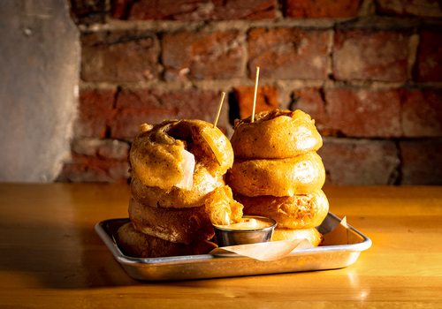 Try the Colossal Onion Rings from Civil Kitchen