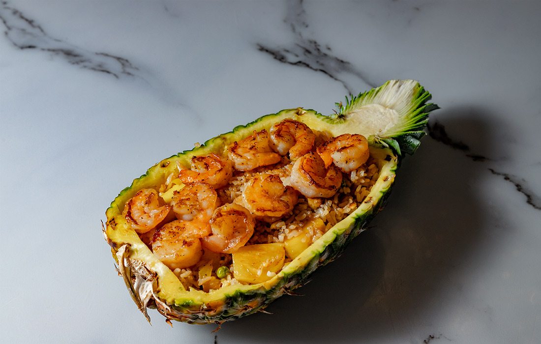 Shrimp served inside a pineapple