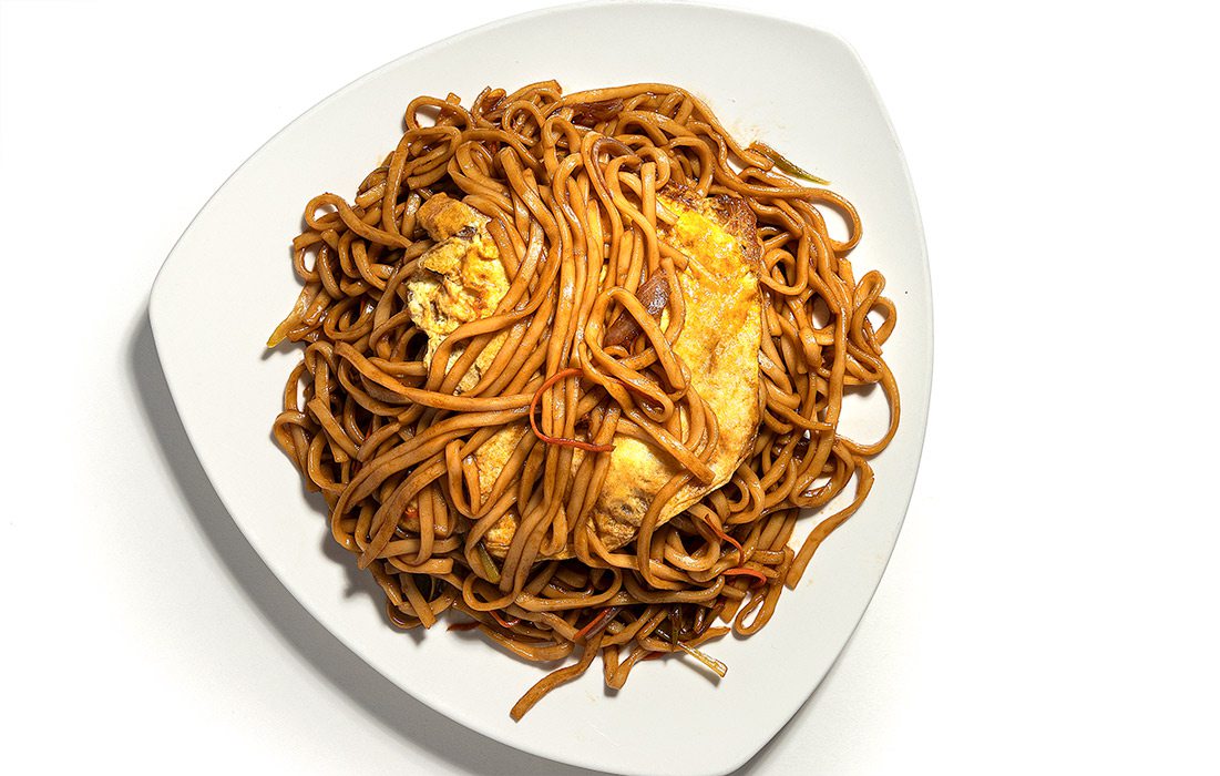 House Stir Fry Noodles on white plate