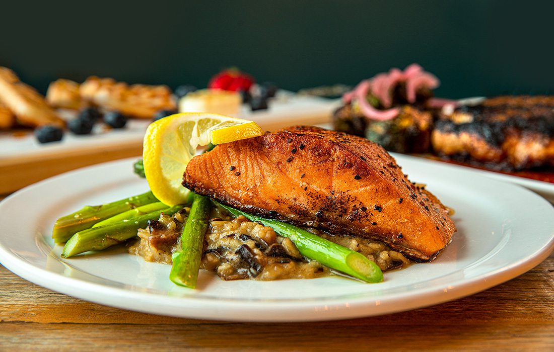 Salmon filet with mushroom and red pepper risotto