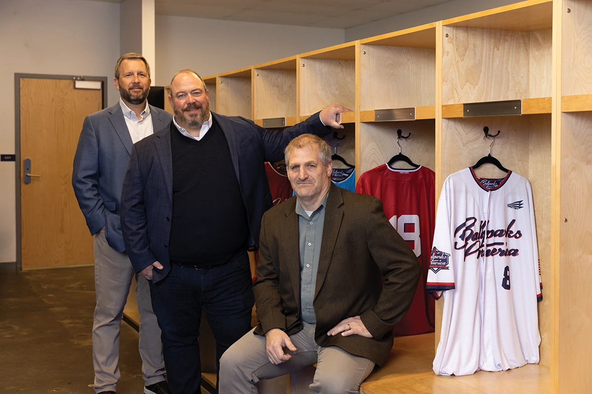 Paul Satterwhite, Steven Strobel and Greg Snider in the locker room.