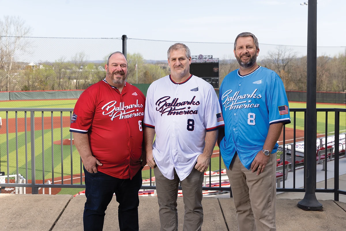 Paul Satterwhite, Steven Strobel and Greg Snider by the field