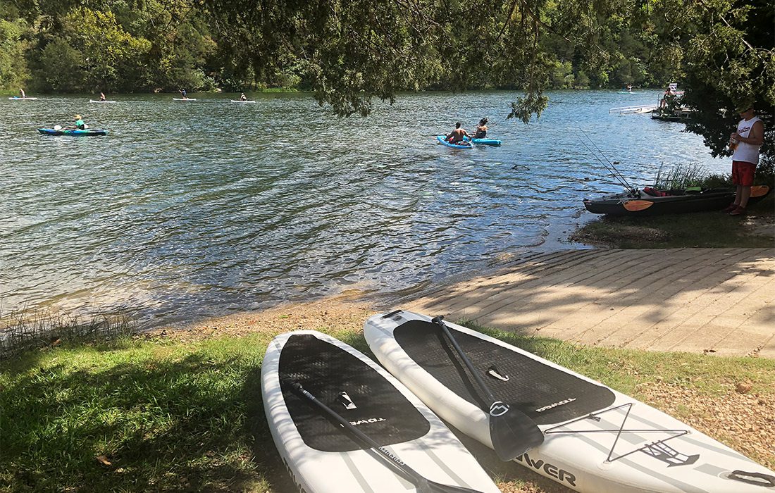 Floating and paddleboarding in Eureka Springs, Arkansas