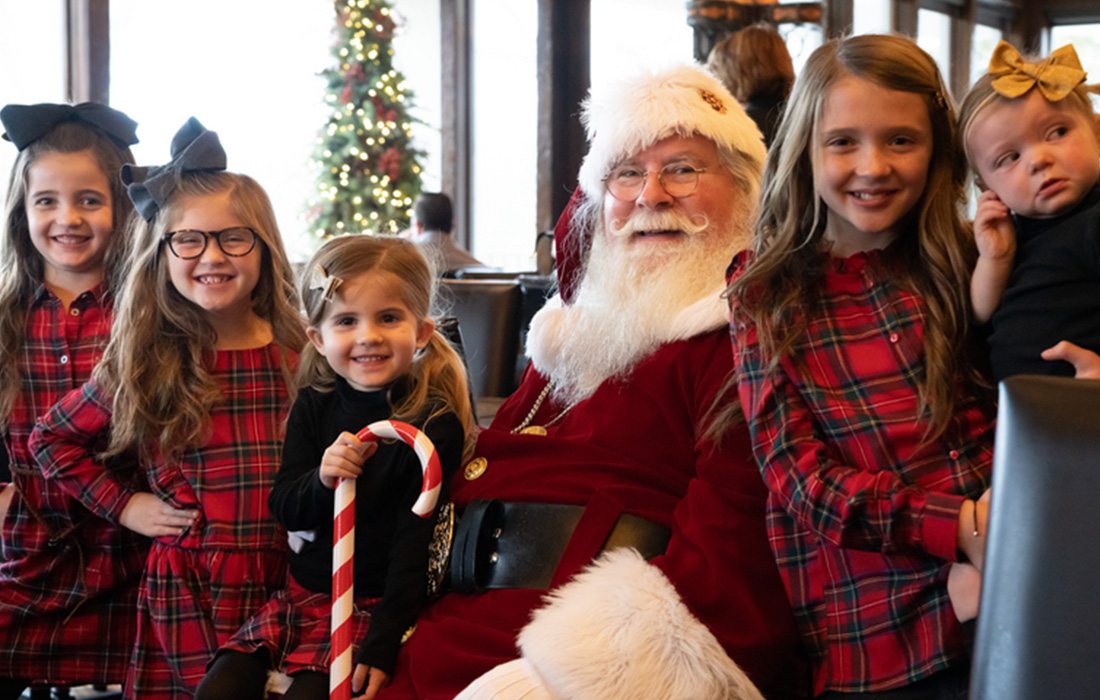 Take your kids to get photos with Santa before the holiday season is over.