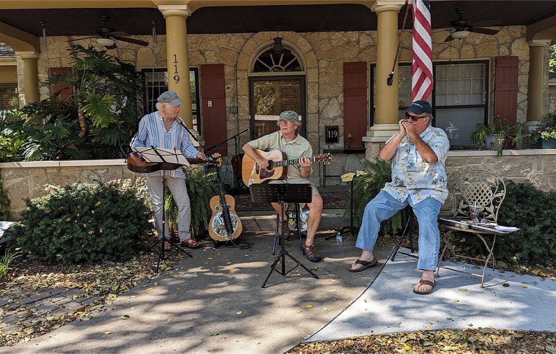 Local musicians transform neighborhood porches into lively stages.