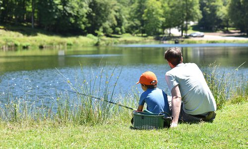 Stock photo of father and son fishing