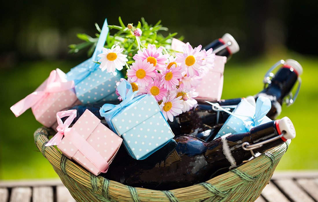 Gift basket with flowers and beer bottles