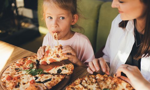 Family eating pizza.
